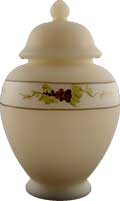 Fenton glass grapes surround the jar with lid Fenton glass grapes surround the jar with lid