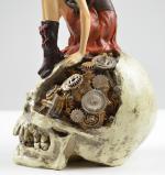 fairy sitting on skull with gears, steampunk fairy sitting on skull with gears, steampunk