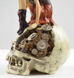 fairy sitting on skull with gears, steampunk